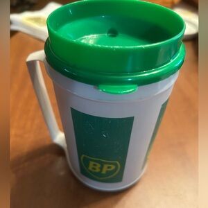 Vintage BP Aladdin brand drinking handled cup w/ a straw/sip hole. 12 oz I think